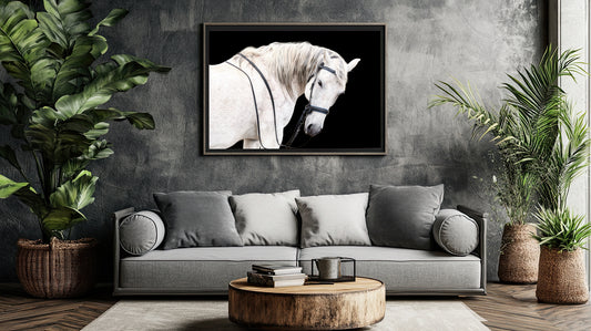 Living room with a gray sofa, wooden coffee table, and framed picture of a horse on a gray wall.