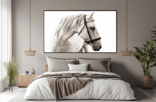 Bedroom with a large framed picture of a horse on the wall.